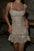 Mini-robe noire à sequins – Glamour et éclat festif